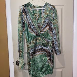 Beautiful green patterned dress. Tags still on. Paid 69.99 for it. Size small.